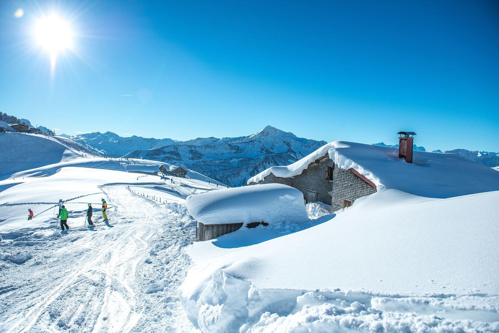 Mountain hut in Austrian mountains covered in Snow